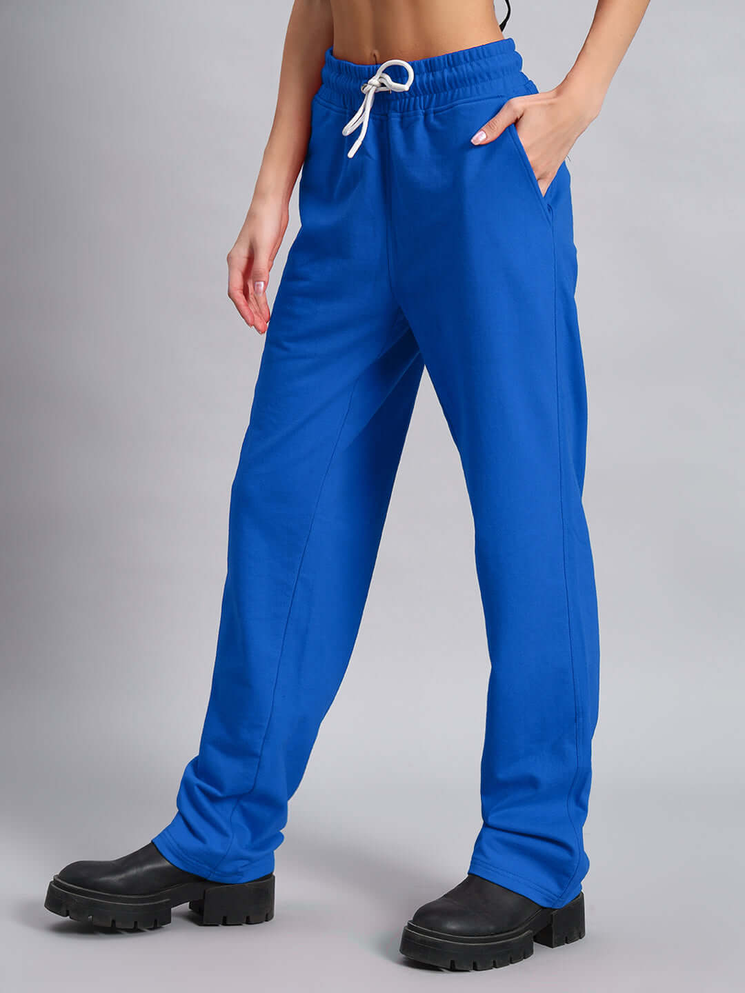 Model wearing Women's DUDS Limited Edition Blue Jogger with elastic waistband and custom fit options.