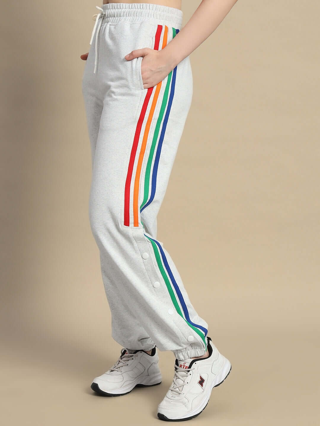 Women's DUDS prism colorful stripe joggers in melange grey, made to order, side view showing rainbow stripes and custom fit option.