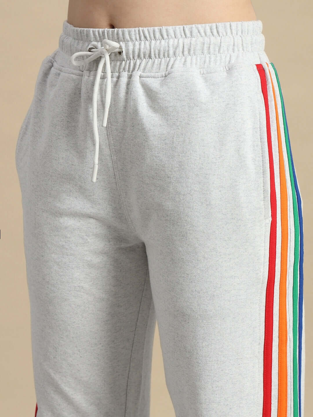 Women's grey joggers with colorful stripes, made to order by DUDS, featuring elastic waistband and custom fit option.