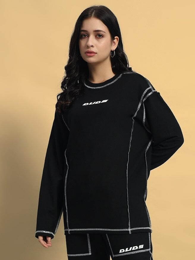Women's black oversized sweatshirt, heavy gauge cotton terry fabric, bIack design, modeled. 240 GSM, made in India.