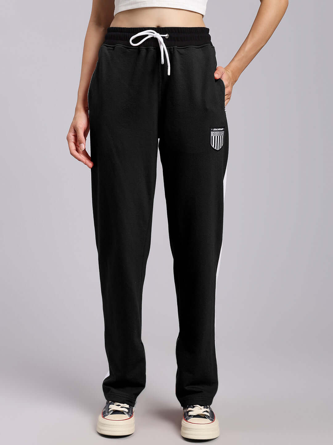 Black women's relaxed-fit joggers with drawstring, designed for elegance and comfort.