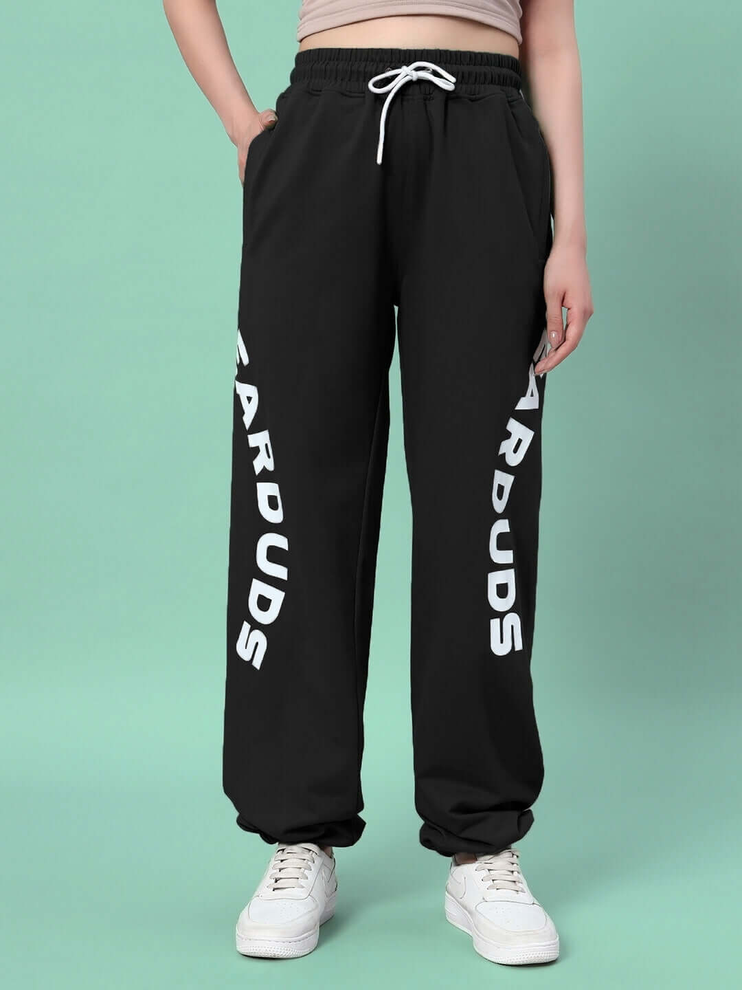 Women's Ellen Relaxed Fit Jogger in Black, featuring adjustable drawstring waist and white lettering, made-to-order by DUDS.