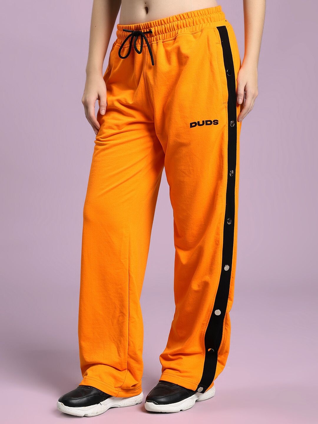 WOMEN'S EMBER BOLT SIDE JOGGER ORANGE with sleek side stripe detail, perfect for comfortable and stylish casual wear.