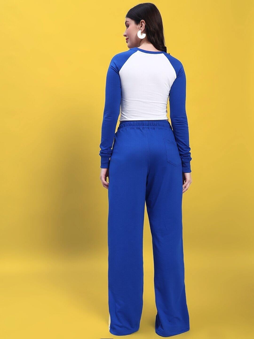 Back view of WOMEN'S EZEL CO-ORD SET ROYAL BLUE-WHITE showing sleek silhouette and bold color contrast.