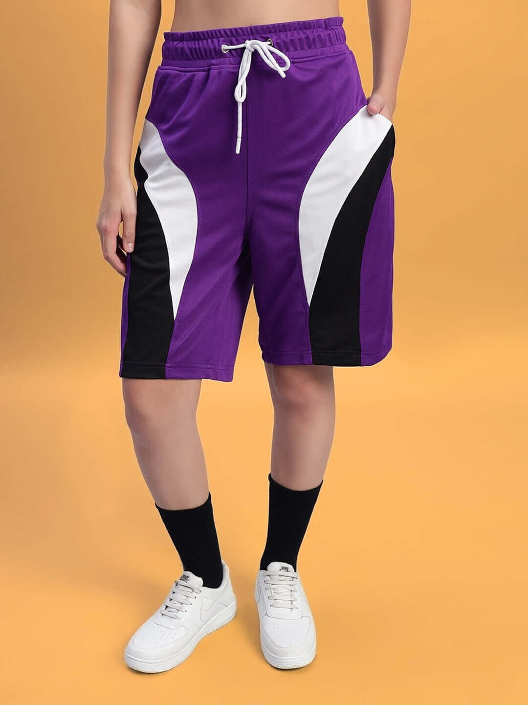 Women's FIFA Colorblock Co-Ord Set Purple shorts from WEAR DUDS, featuring a vibrant and sporty design.
