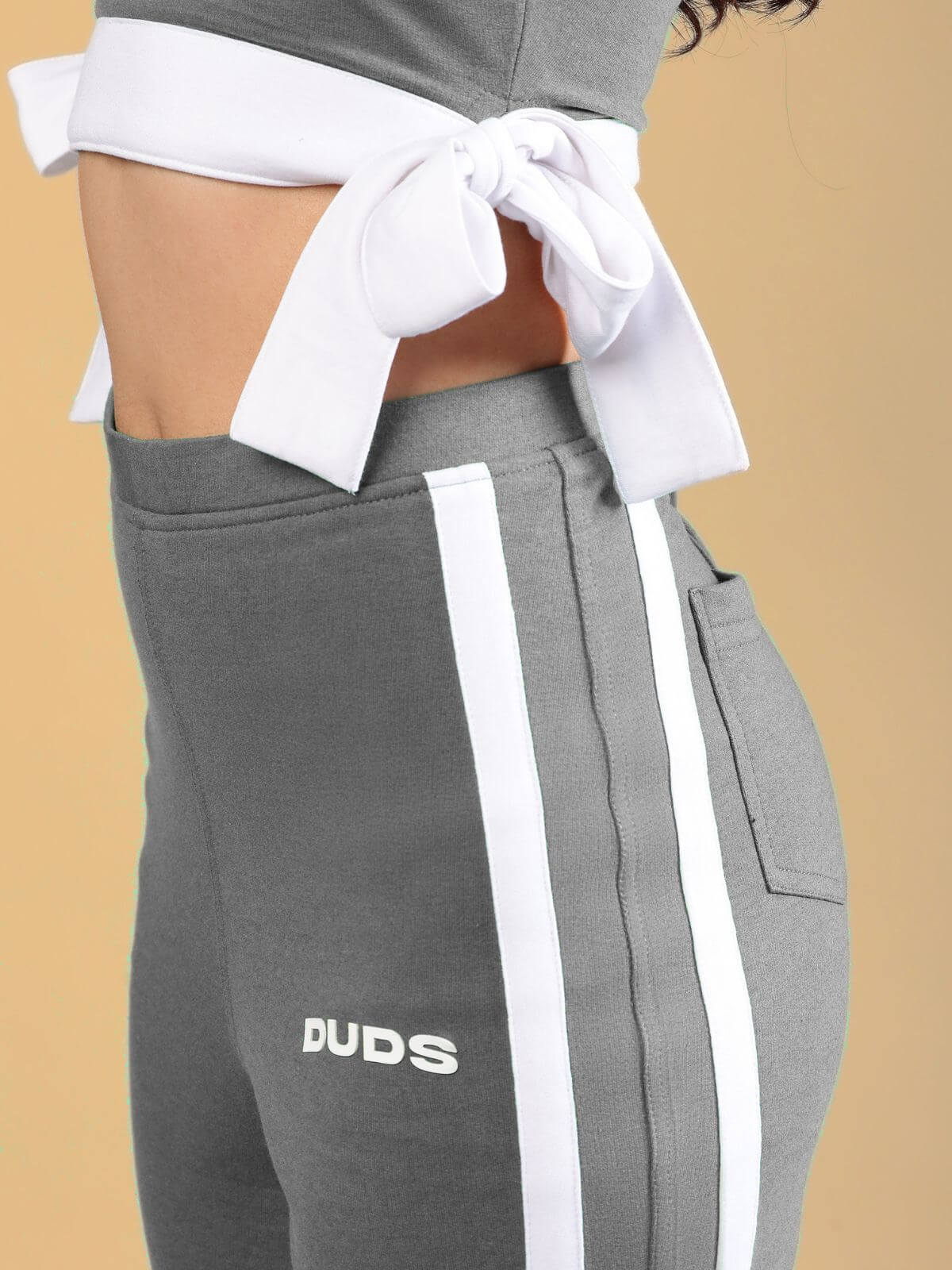 WOMENS FITTONIA COOL CO-ORD SET GREY showcasing stylish grey co-ord set with white detailing, perfect for casual outings.