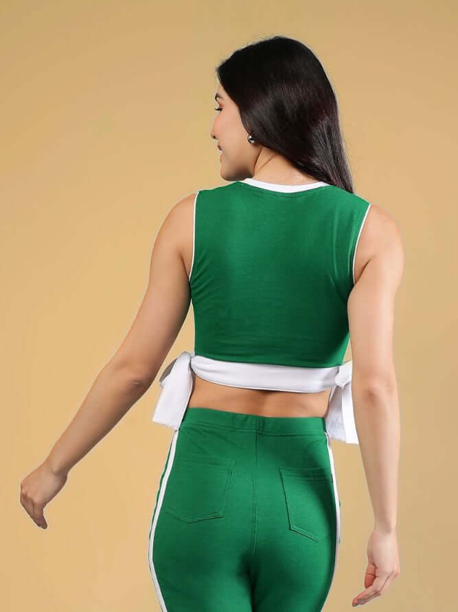 WOMENS FITTONIA COOL CROP TOP GREEN, stylish green crop top worn with matching bottoms from the back.