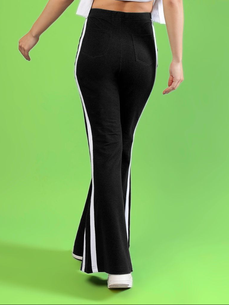 WOMENS FITTONIA COOL WIDE FLARE JOGGERS BLACK shown from the back, highlighting stylish wide-flare silhouette in black.