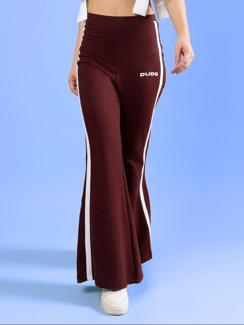 WOMENS FITTONIA COOL WIDE FLARE JOGGERS MAROON with stylish white stripes and a relaxed fit.