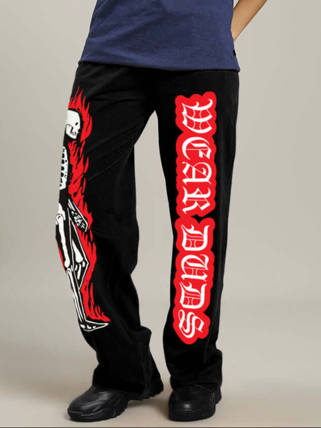 Women's relaxed fit jogger with flaming skeleton print, black color, designed by DUDS. Ideal for a custom, stylish look.