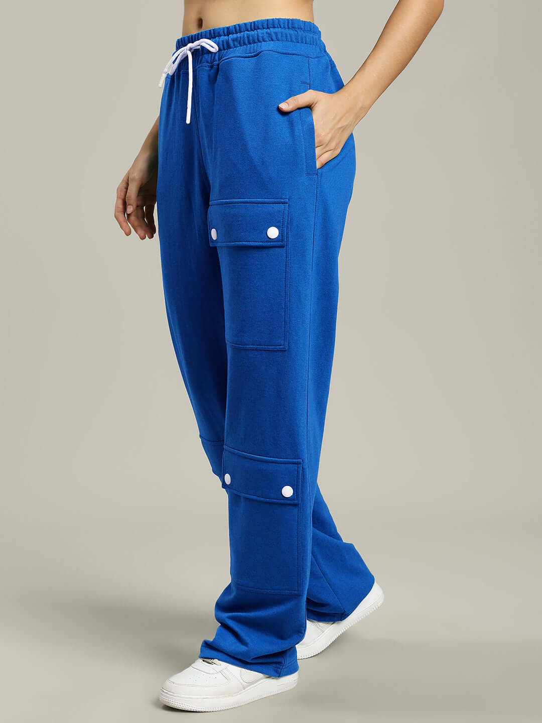 Women's blue baggy jogger with flap pockets, designed for custom fit and comfort, tailored by DUDS.