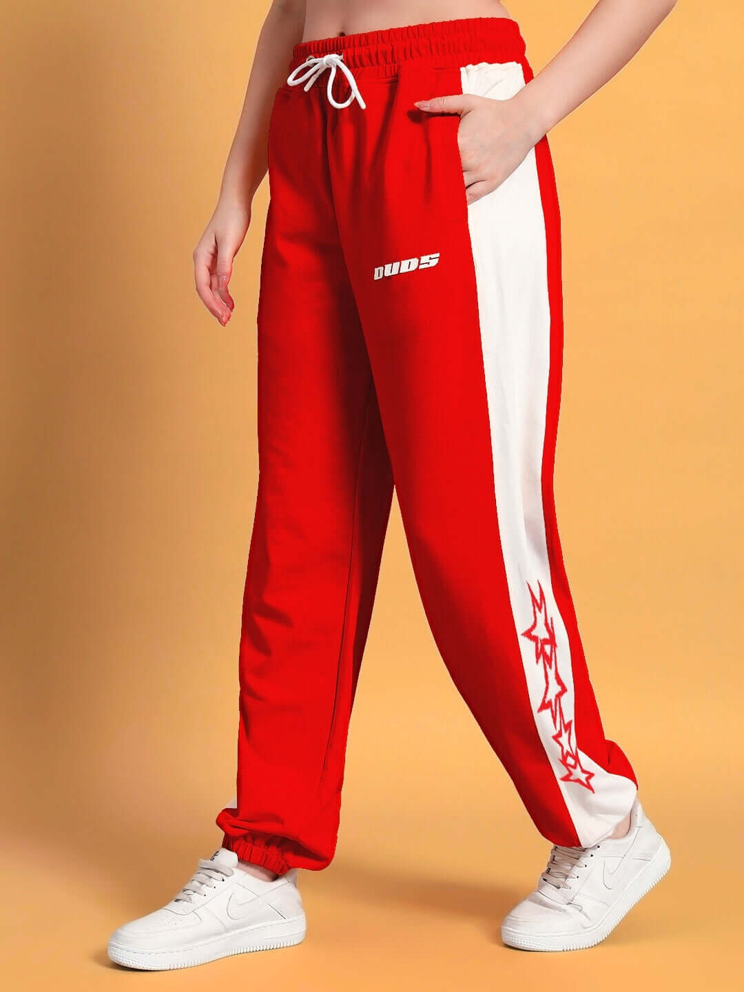 Women's Flash Relaxed Fit Joggers in Red-White with white side stripes and star design, made with quality by DUDS experienced tailors.