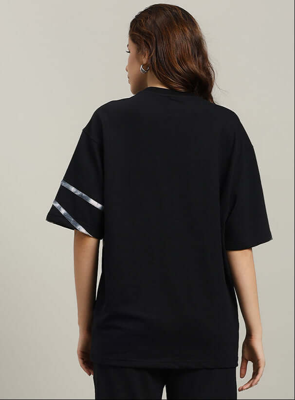 Back view of WOMEN'S FLICKER DESIGNER OVERSIZED T-SHIRT BLACK with premium heavy gauge fabric.