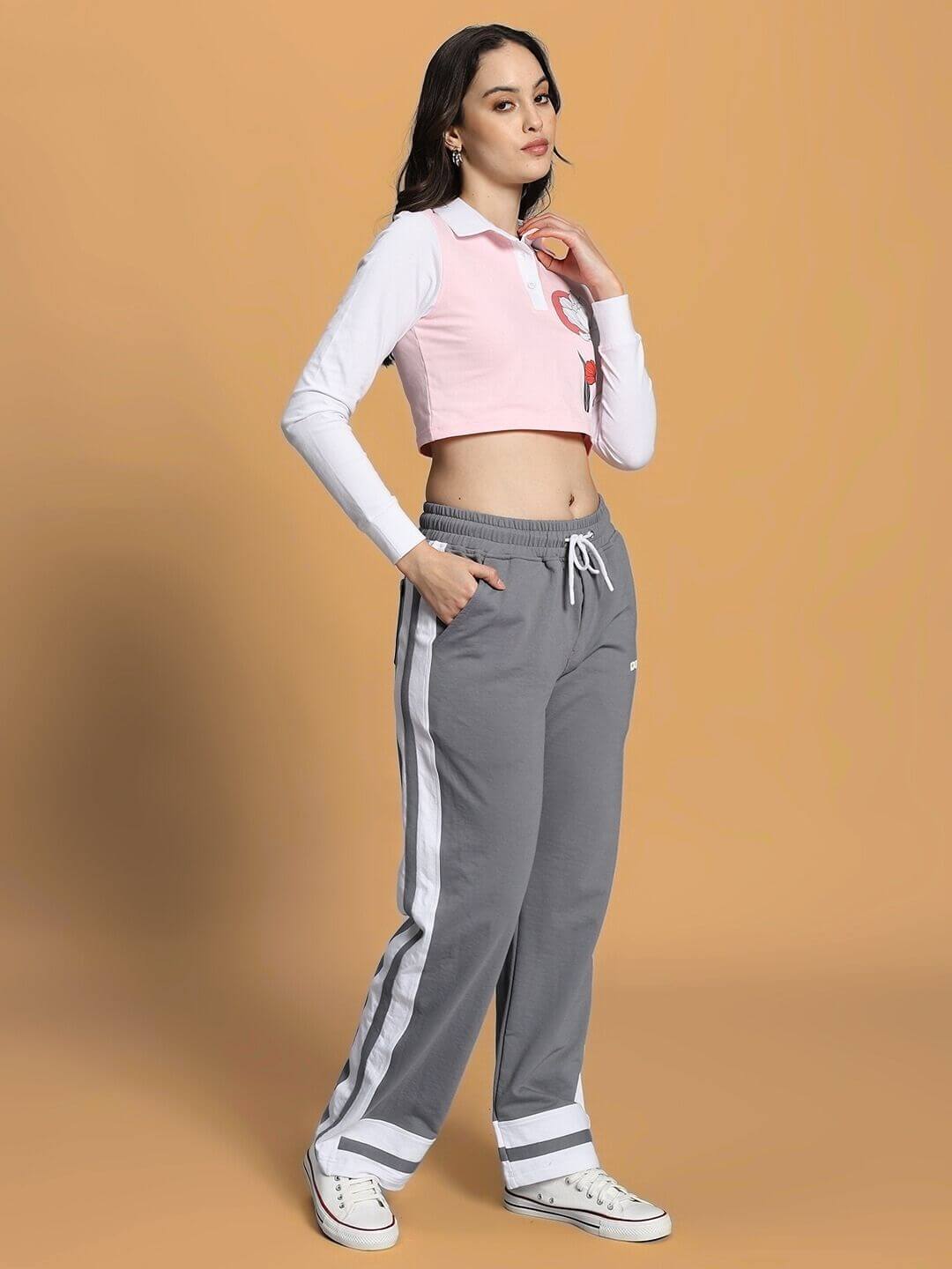Model wearing Women's Flora Co-Ord Set in Pink and Grey, featuring a crop top and drawstring pants, made with premium cotton fabric.