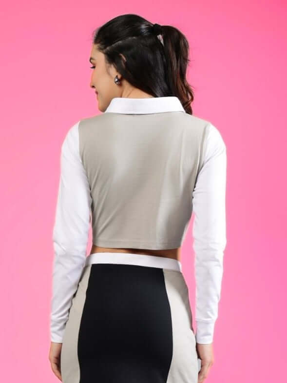 Back view of woman's grey and white flora crop top with regular sleeves, made of premium cotton French terry lycra blend.