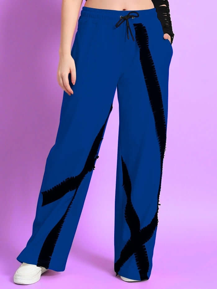 Women's blue jogger pants with frayed textured stripes design, customizable fit, handmade by DUDS tailors, front view.
