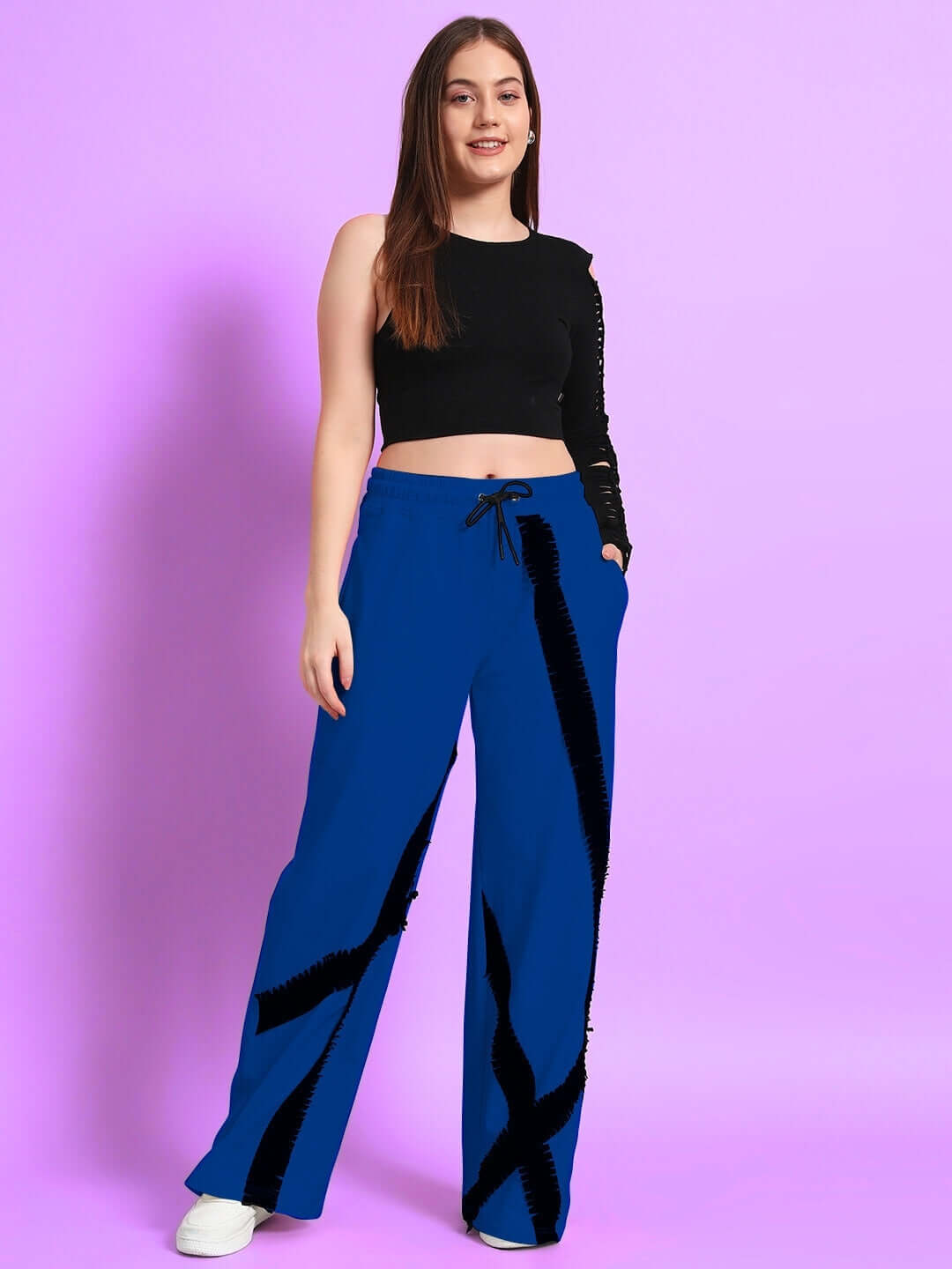 Woman wearing women's frayed textured stripes jogger in blue with black top, product by DUDS, customizable fit available.