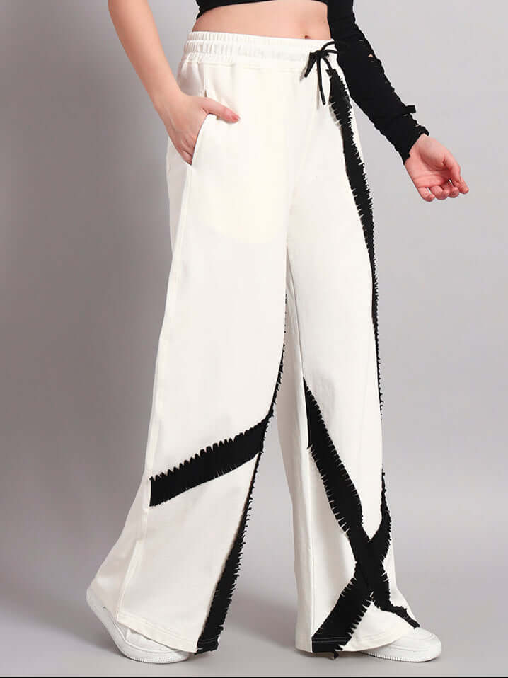 Women's frayed textured stripes joggers in off-white with customizable size options by DUDS, featuring a unique handmade design.