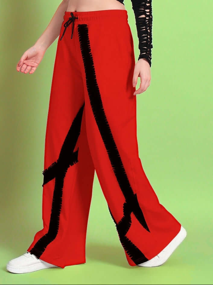 Red women's frayed textured stripe joggers by DUDS, showcasing unique design and relaxed fit.