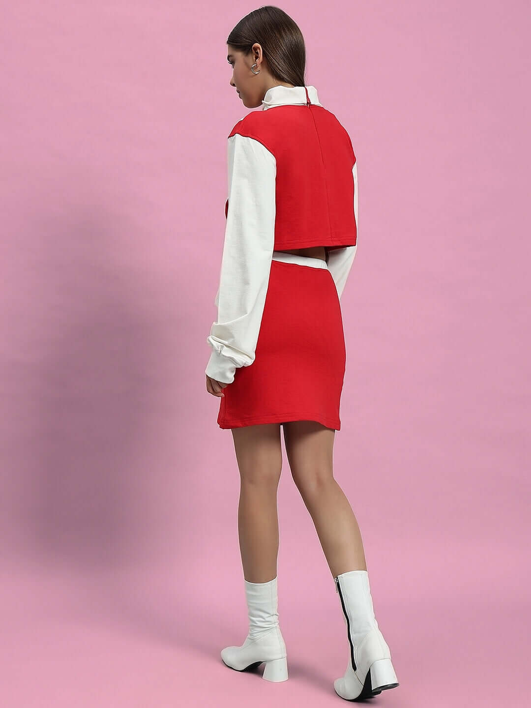 Model wearing women's Freya co-ord set in off white and red, featuring a crop top and skirt, crafted from premium cotton blend fabric.