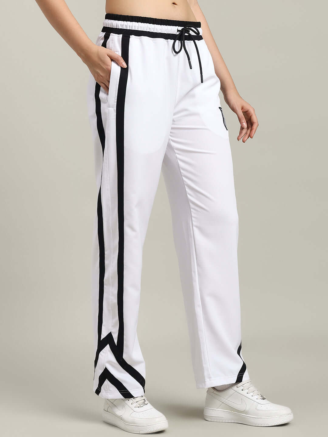 WOMEN'S FRIZZLE RELAXED FIT JOGGER WHITE with black stripes, comfortable and stylish for casual wear.