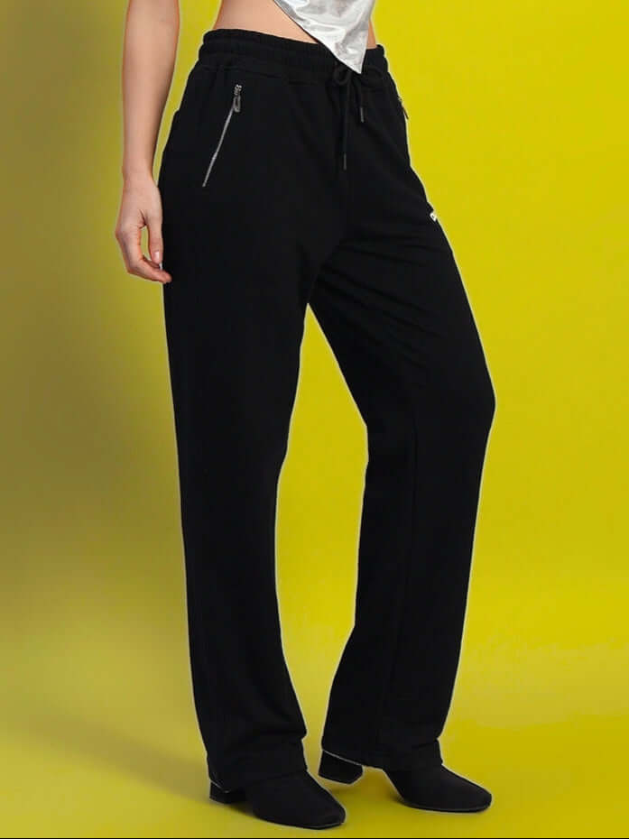 Women's Harper Relaxed Fit Jogger in black, made-to-order with customizable size, displayed on yellow background.
