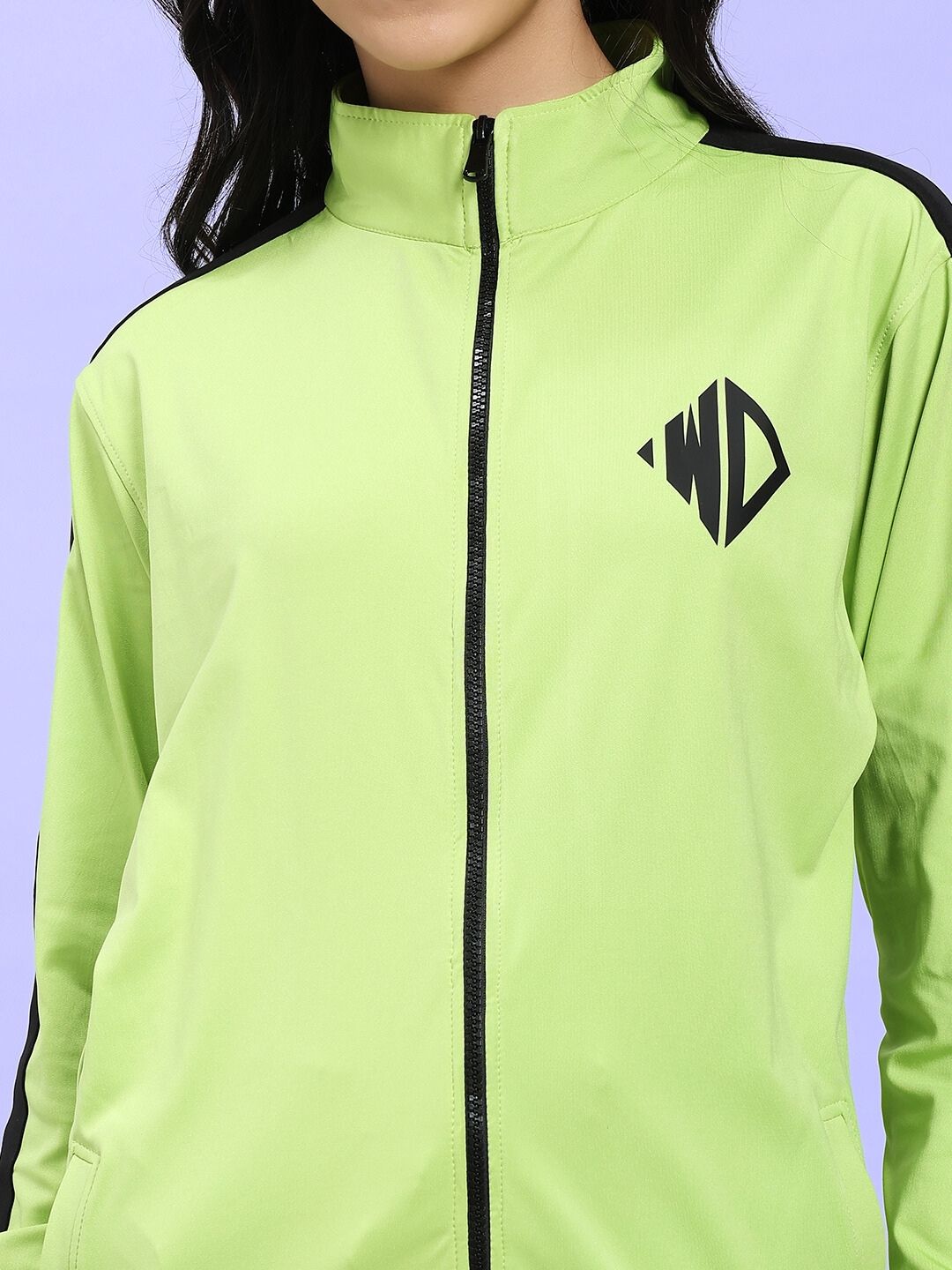 WOMEN HIGH PERFORMANCE CO-ORD SET NEON GREEN jacket detail showing sporty design and logo.