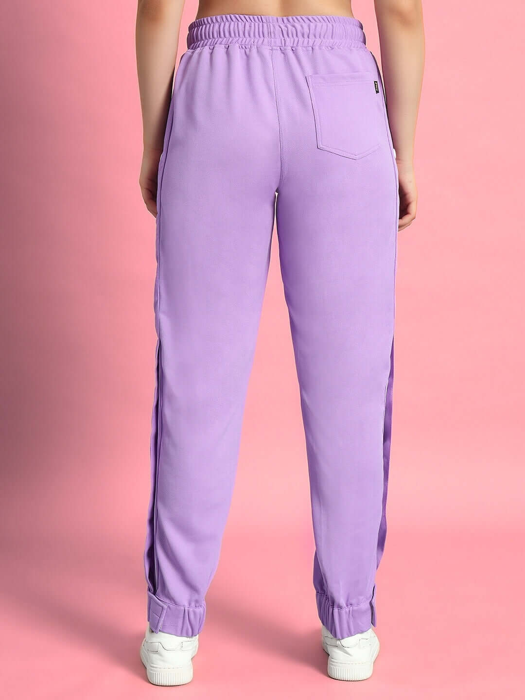 Back view of lavender women's hip hop joggers by DUDS, featuring custom fit option and made-to-order craftsmanship.