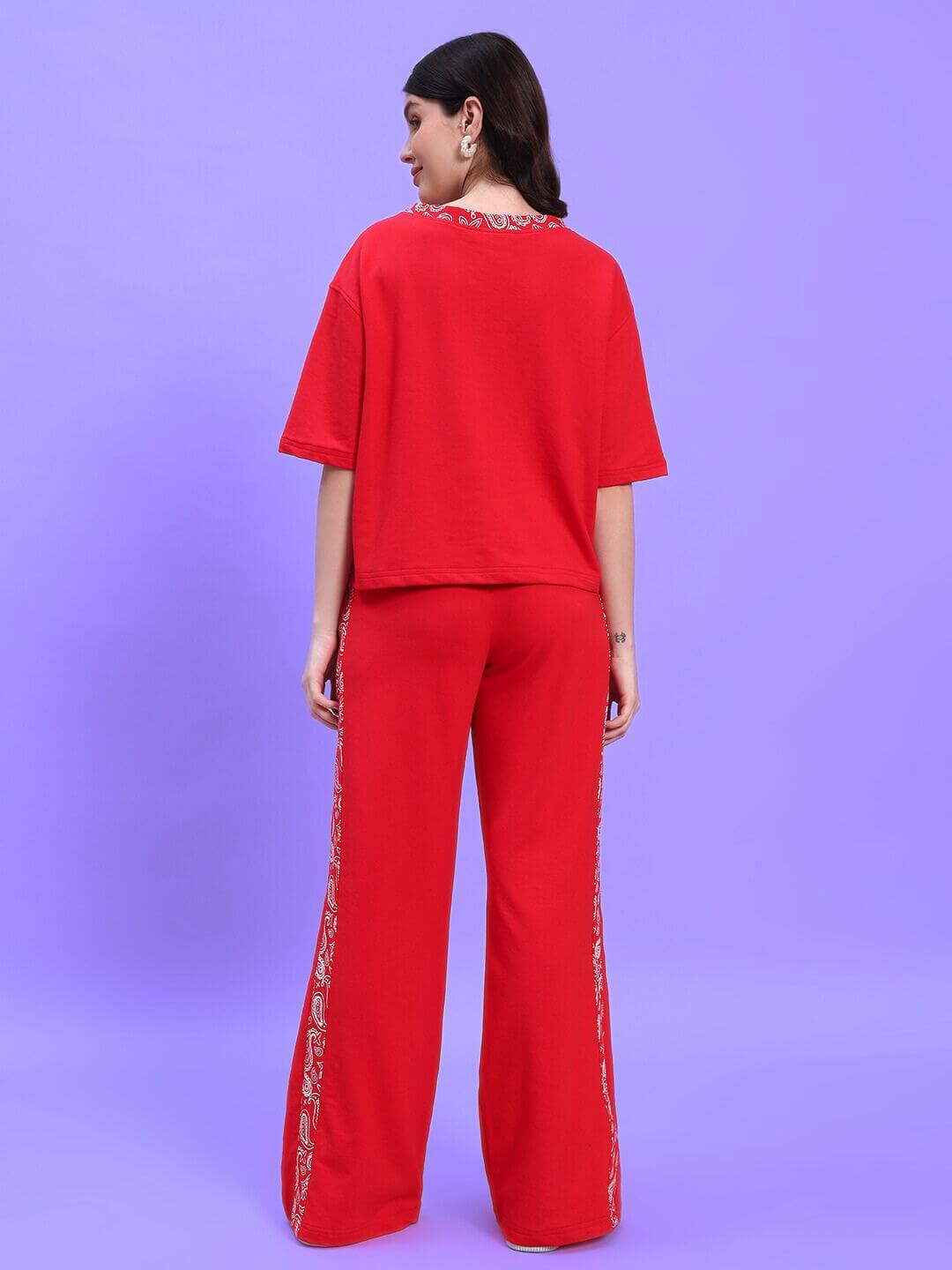 Back view of WOMEN'S HOLLY CO-ORD SET - RED showing vibrant color and stylish design