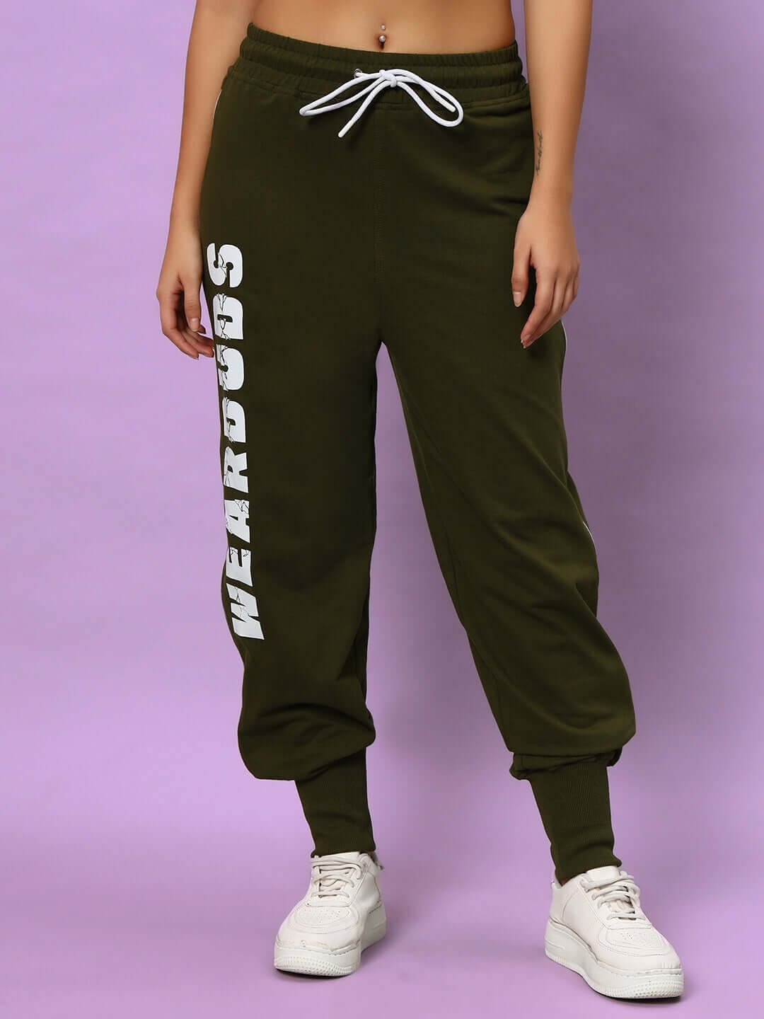 Women's olive green joggers by DUDS, featuring white drawstring and bold side text. Comfortable and stylish for casual wear.