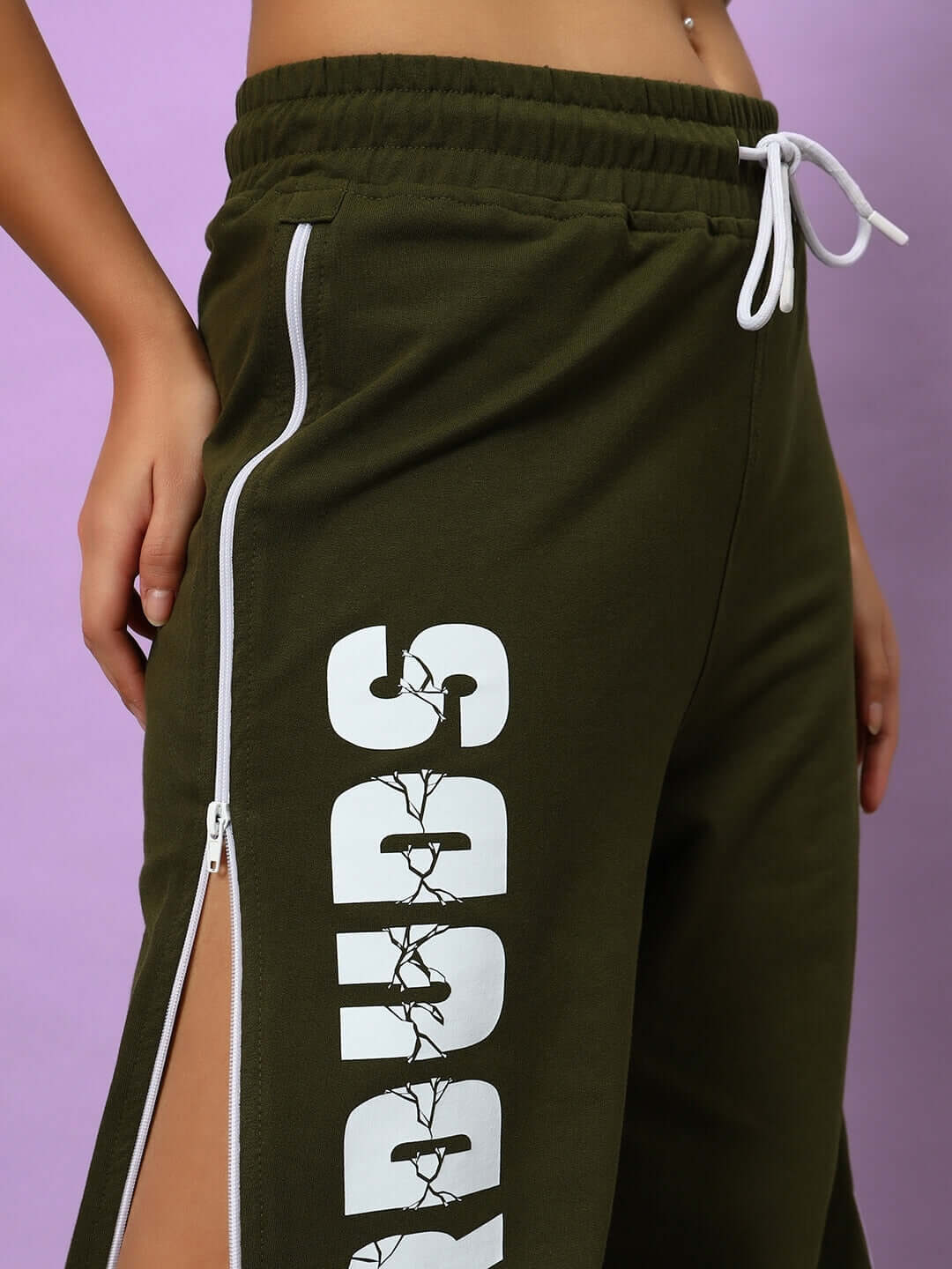 Olive green women's joggers by DUDS with side zippers and logo, featuring custom fit option for prepaid orders.