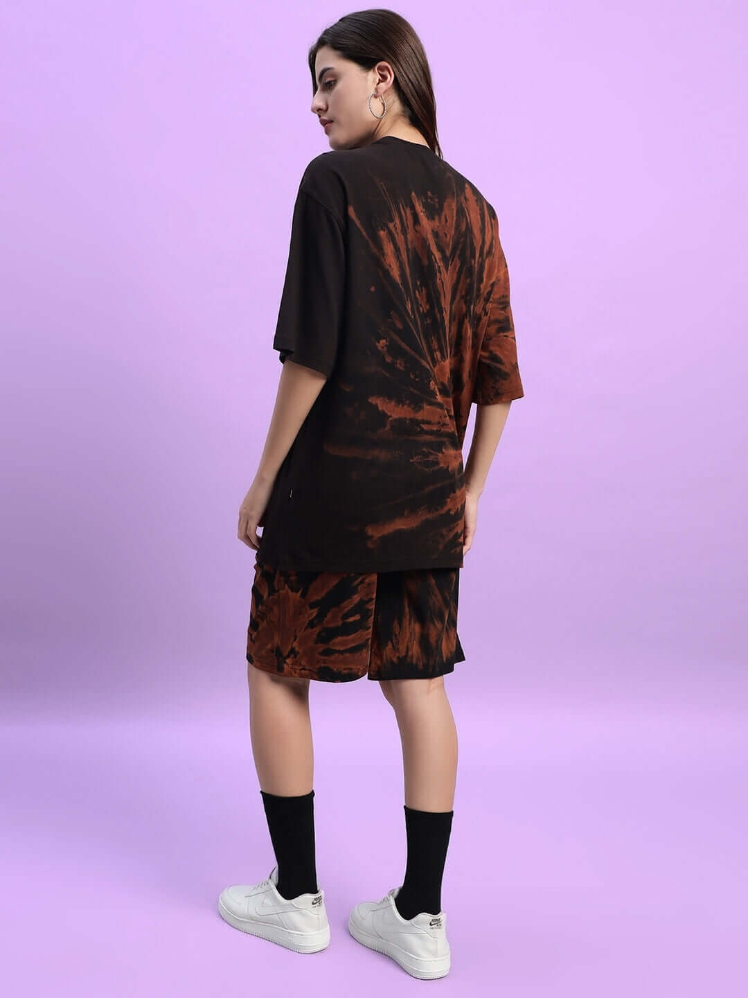 Model wearing Women's Hustler Tie-Dye Black Co-Ord Set, featuring premium heavy gauge fabric, French Terry Lycra, and cotton.