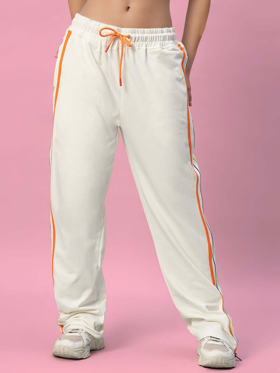 Women's Imperial Side Zipper Joggers in Off White with orange stripe detail and customizable fit option by DUDS.