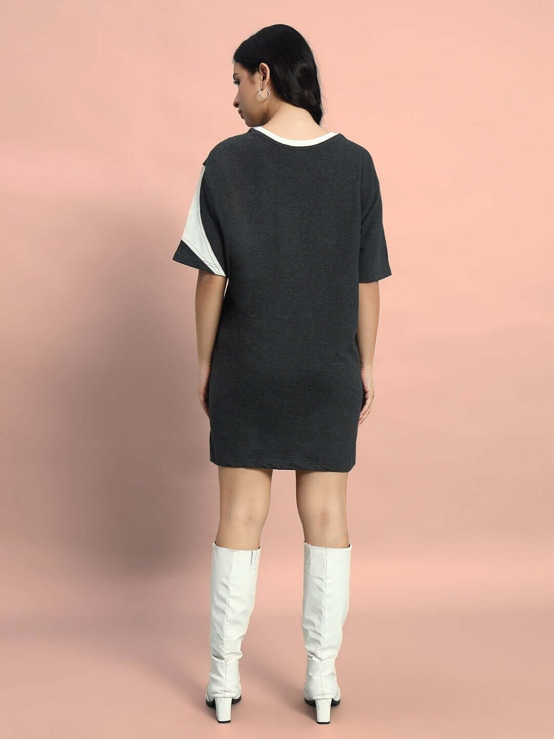 Back view of model wearing Women's Jackson Dress in dark grey, made from 100% cotton terry fabric, showcasing a simple yet elegant design.