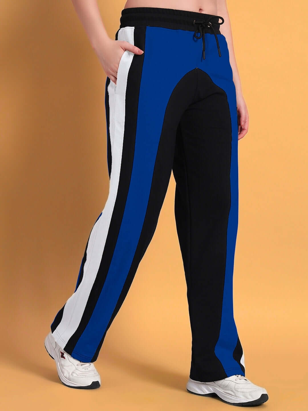 Women's Jamison color block relaxed-fit joggers in black and blue with side stripe detail, ideal for custom-fit orders.