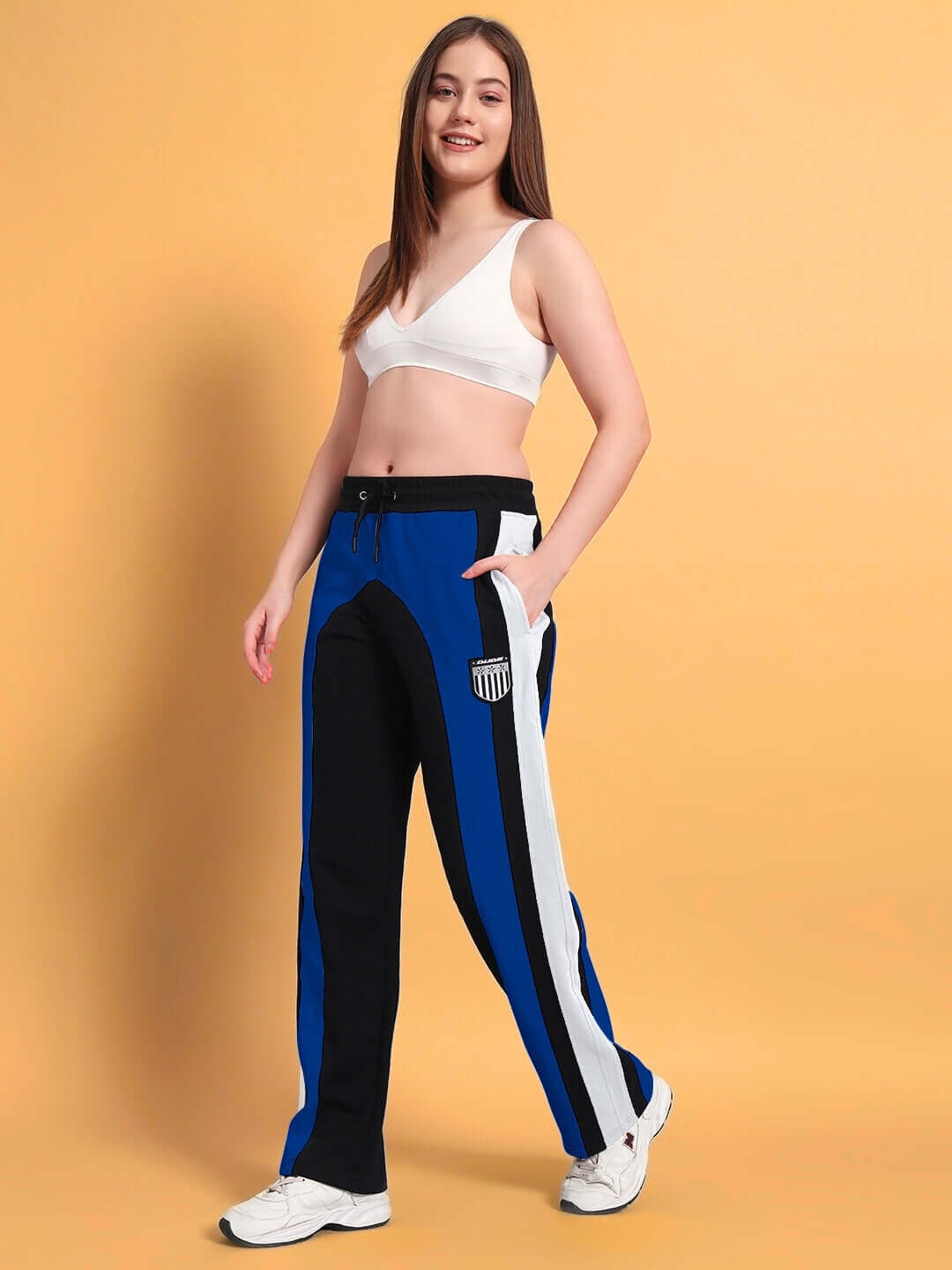 Women's Jamison color block relaxed-fit joggers in black and blue, modeled with a sporty look.