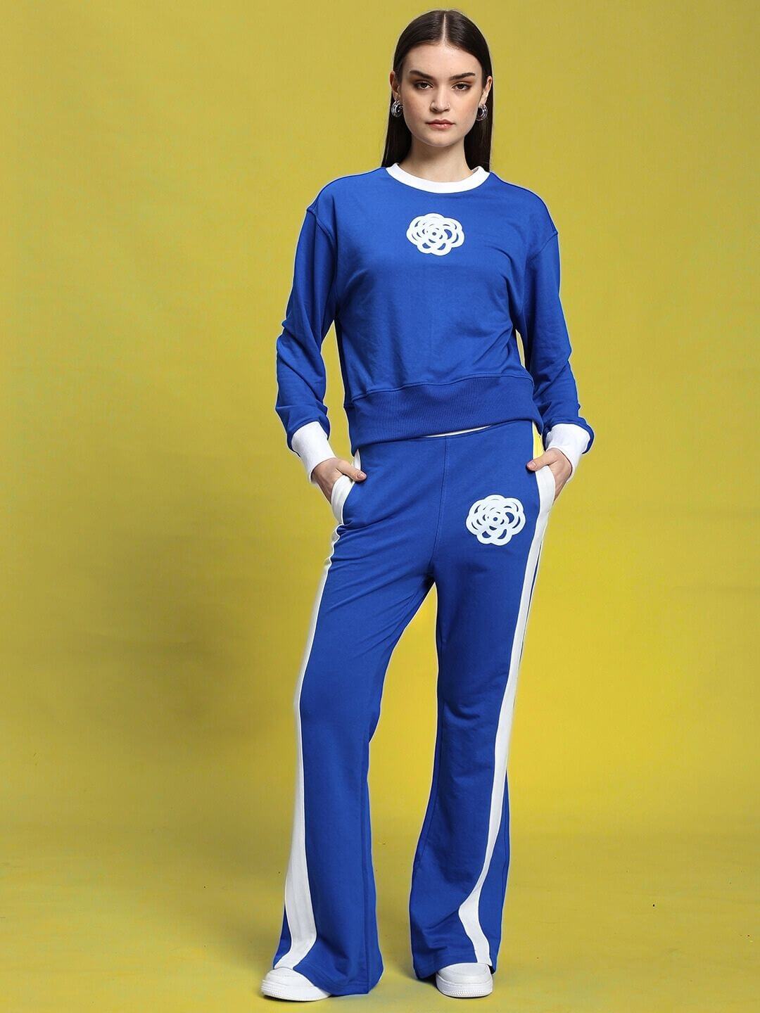 Woman wearing royal blue relaxed fit co-ord set with contrast panels, featuring elasticated waistband and drawstring, by Jessflick.