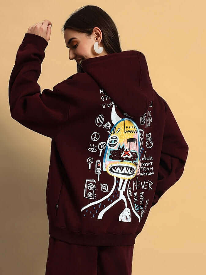 Women's wine fleece co-ord featuring artistic back design, perfect for stylish and cozy streetwear fashion.