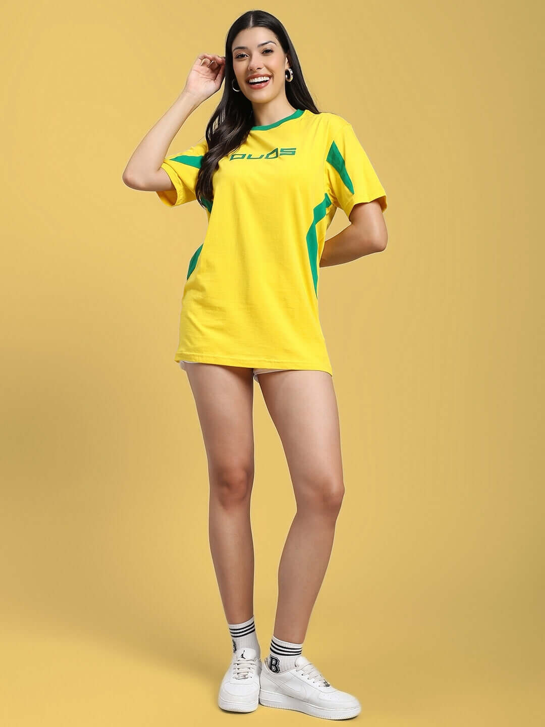 Woman wearing yellow-green women's regular fit t-shirt made of 100% cotton.