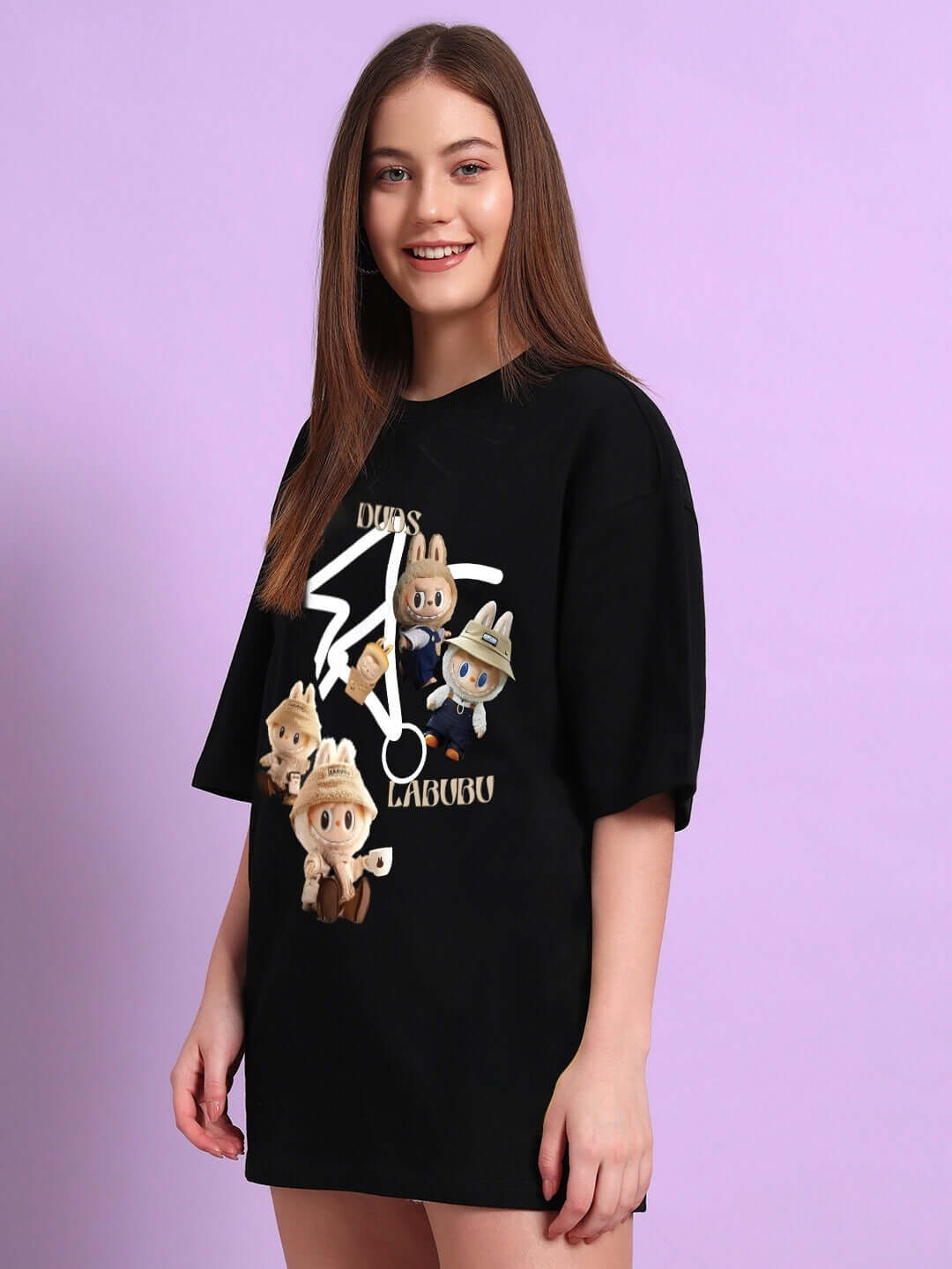 Woman wearing black oversized T-shirt with Labubu gang print, premium cotton fabric.
