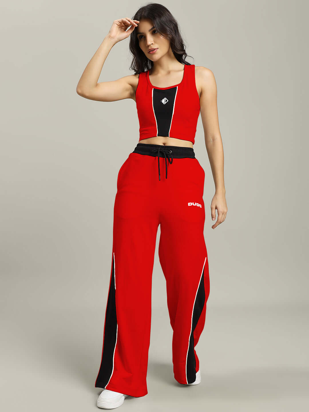 Stylish women's red-black Larissa co-ord set with a tank top and trousers, crafted from premium cotton blend, perfect for a modern look.