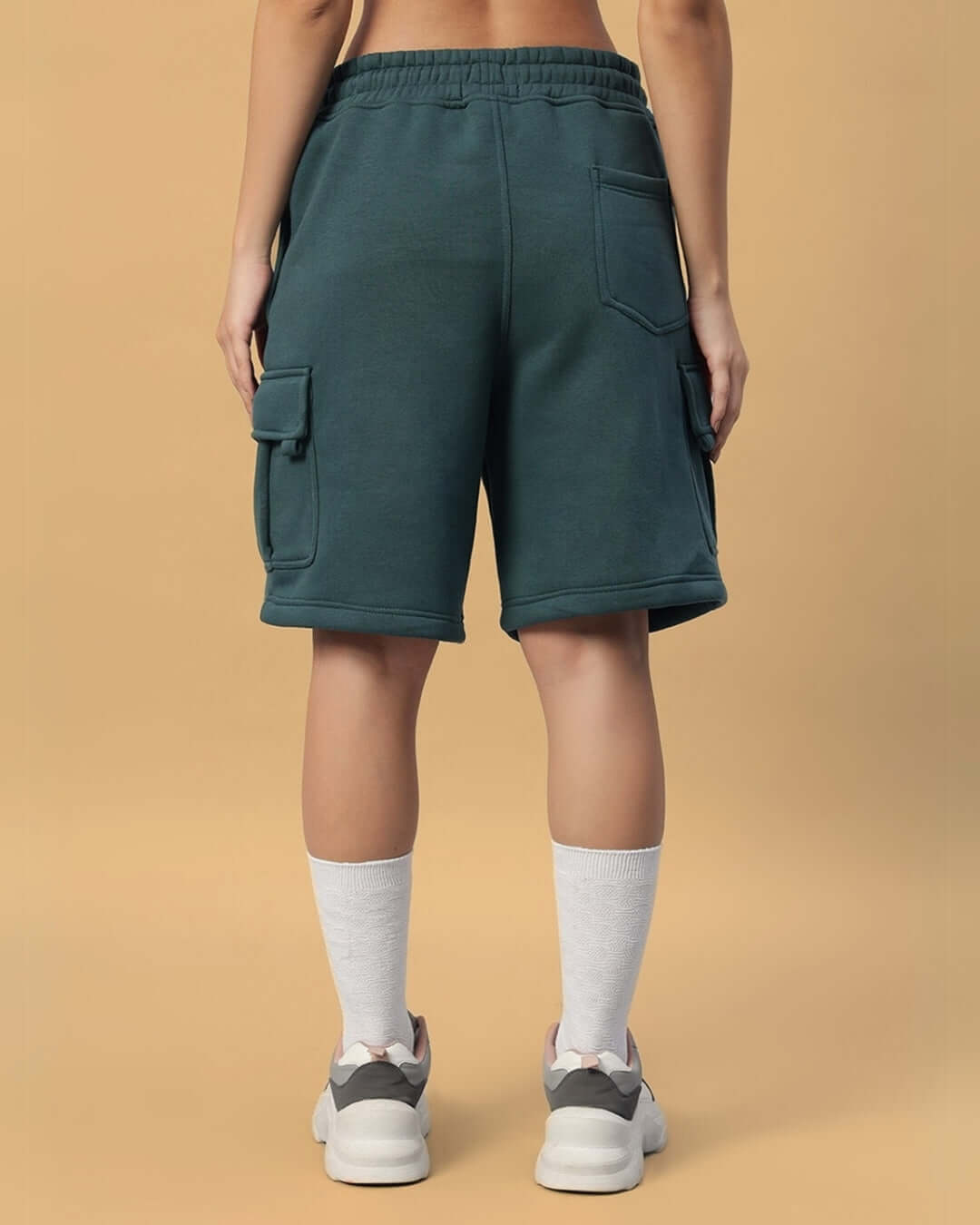 Back view of Women's Leopard Shark Fleece Co-ord Teal Green shorts, highlighting pocket details and comfortable fit.