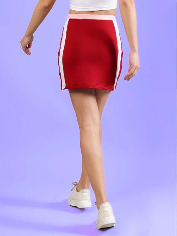 Back view of Women's Libi Colorblock Skirt in red with white stripes, perfect for sporty and casual looks.