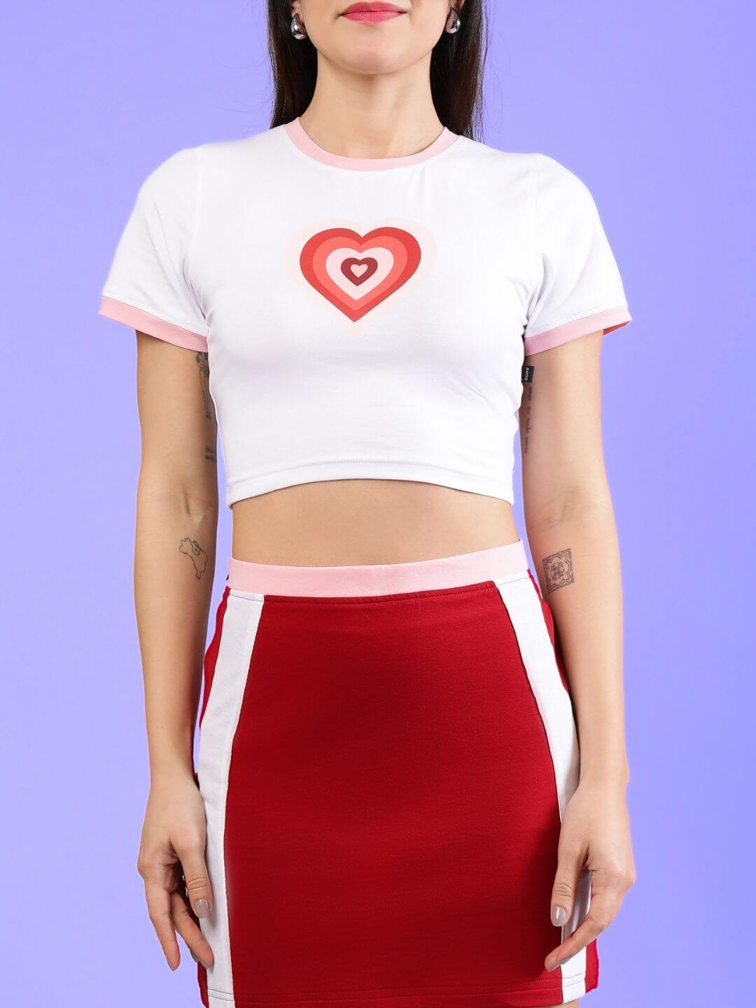 WOMEN'S LIBI HEART ACTIVE CO-ORD SET WHITE-RED by WEAR DUDS, featuring a heart design on a white crop top with a matching red skirt.