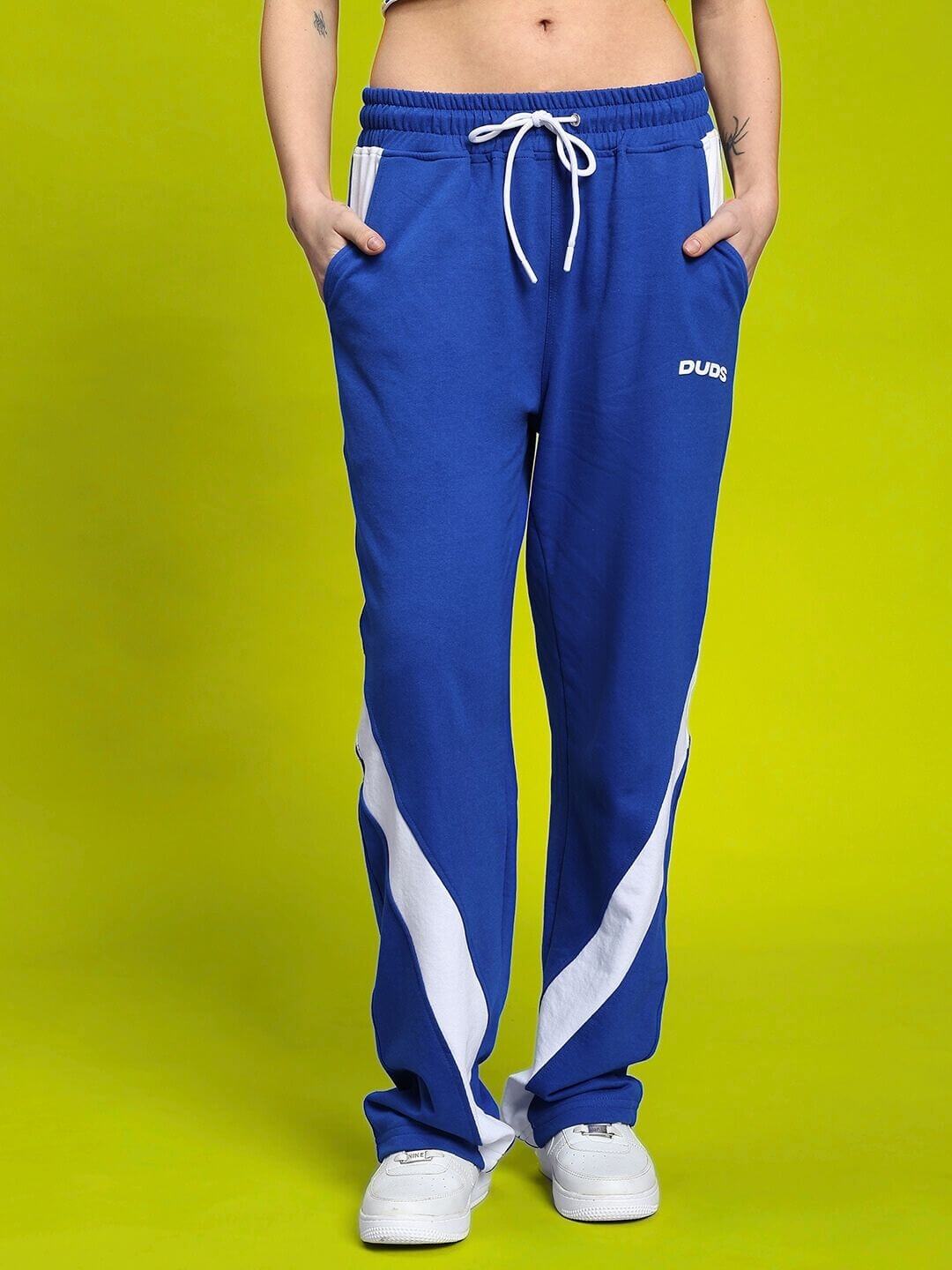 Model wearing WOMEN'S LIVIANA COOL CO-ORD SET BLUE-WHITE from Wear Duds, showcasing stylish blue and white jogger pants.