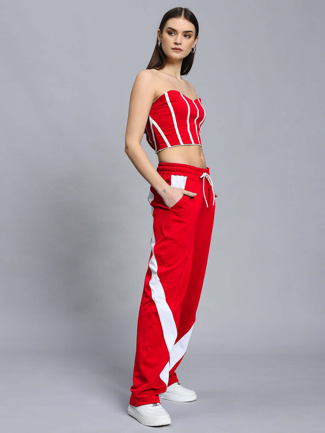 Model wearing WOMEN'S LIVIANA COOL CO-ORD SET RED, featuring a stylish modern red and white design from WEAR DUDS.