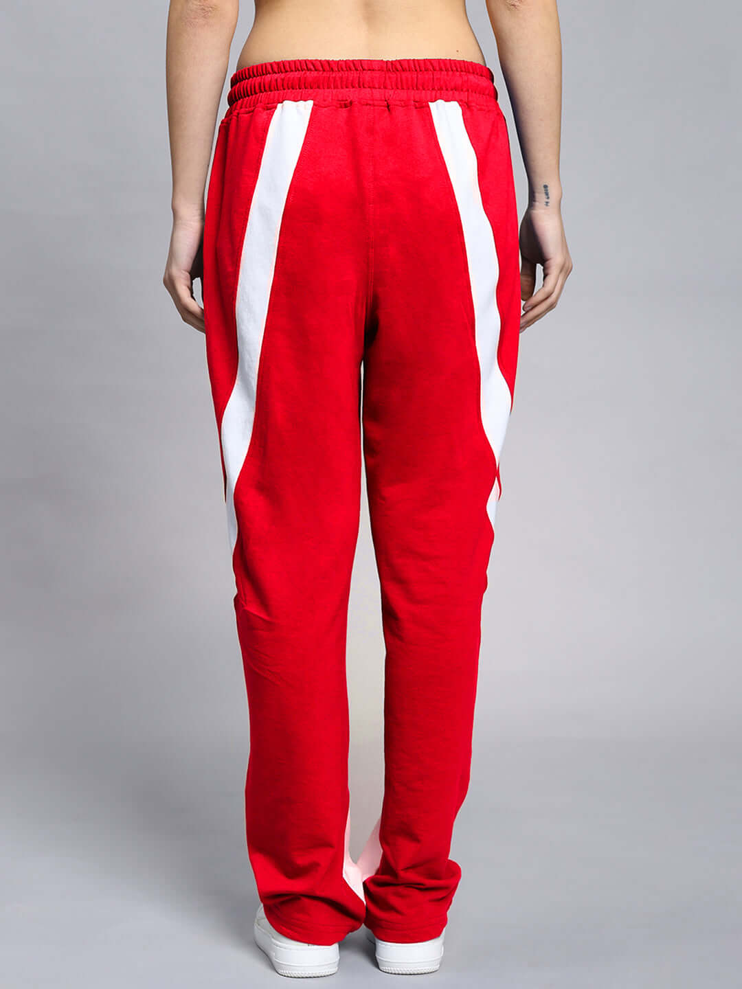 Back view of Women's Liviana Cool Co-Ord Set Red pants, showcasing bold red color and modern design.