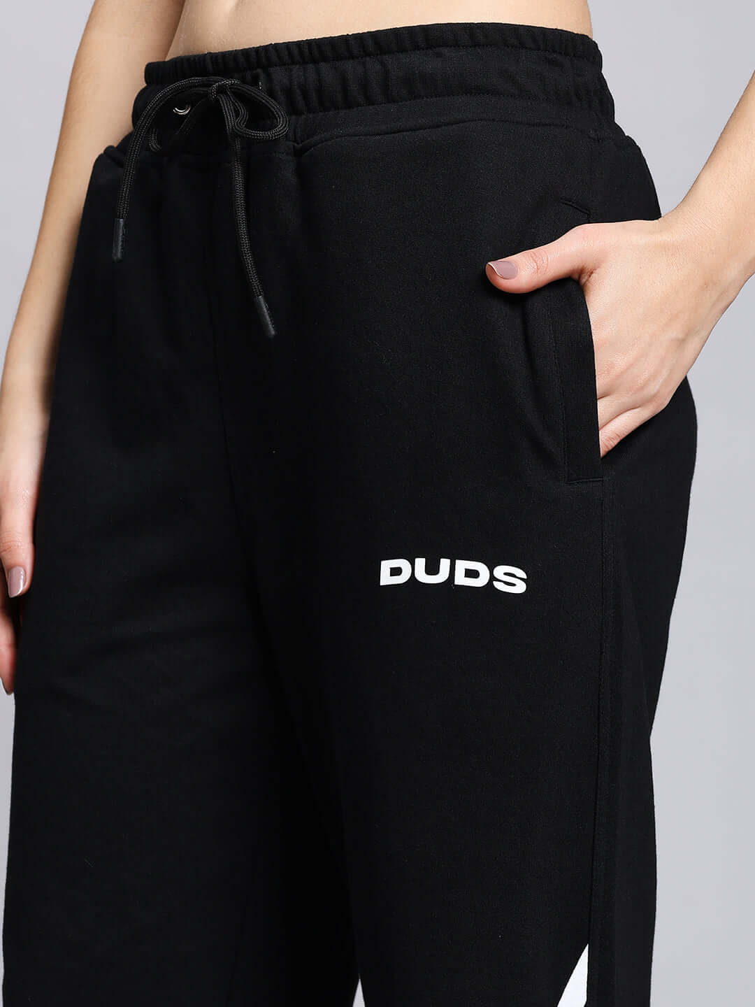 Close-up of women's Megastar 2 Stripe Jogger in black by DUDS, featuring a comfortable fit and stylish design with side pocket.