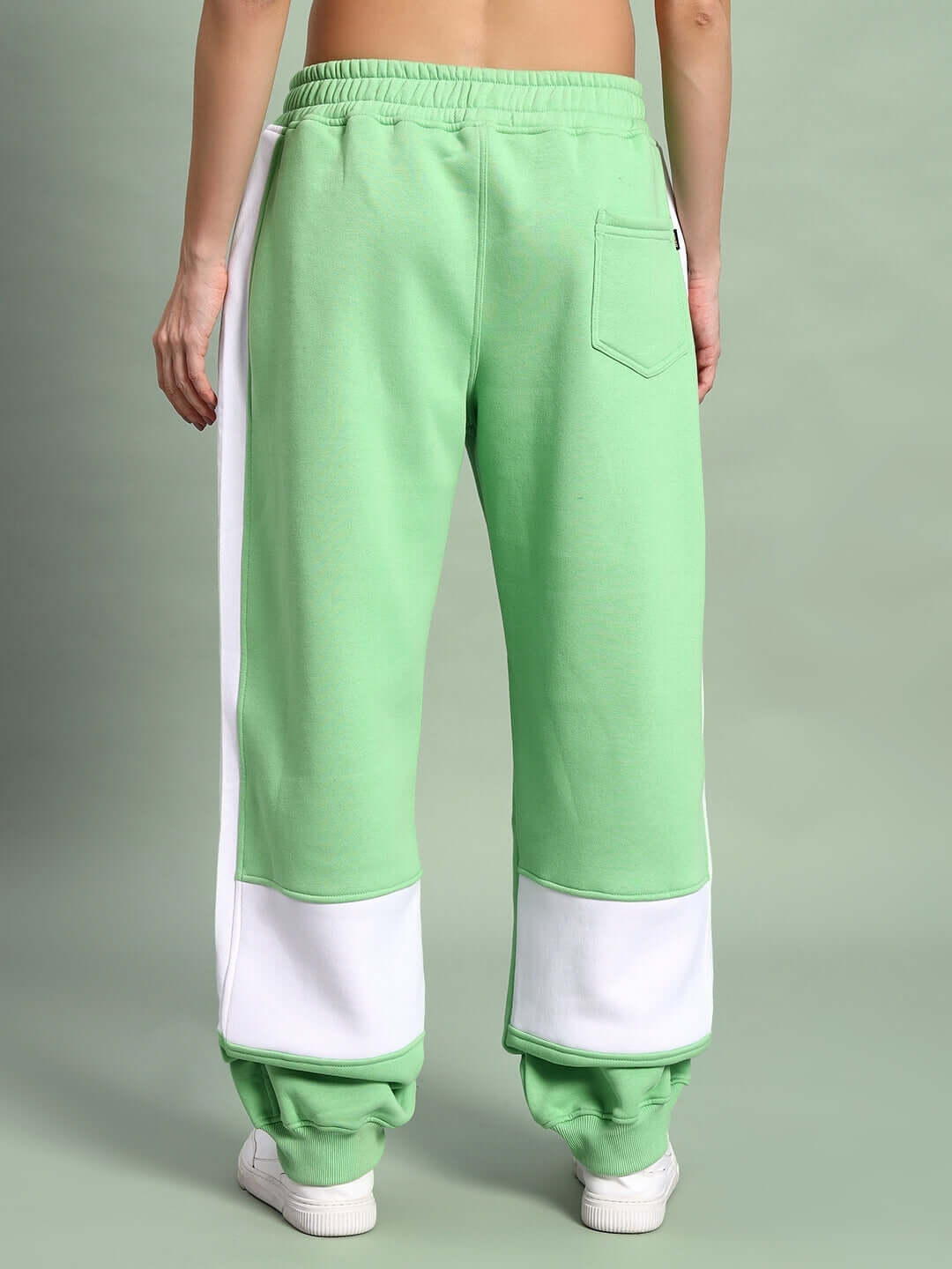 Back view of WOMEN MINTED BLISS FLEECE CARGO PANT GREEN WHITE showing relaxed fit and pocket detail.