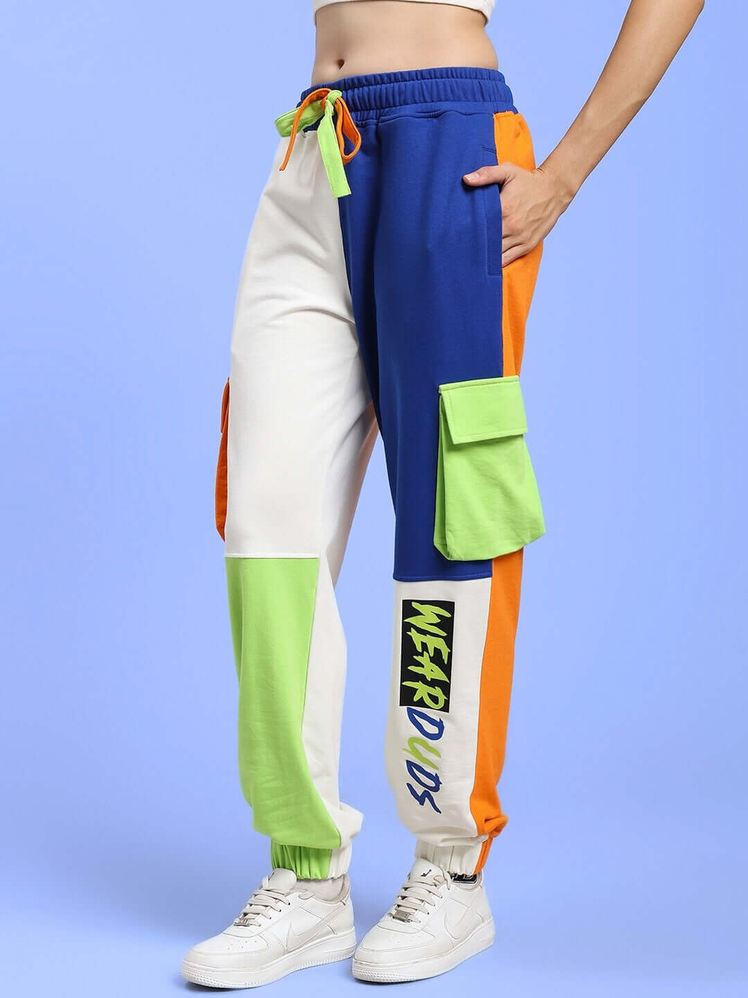 Women's colorblock joggers with multi pockets, featuring relaxed fit and vibrant design by DUDS for custom and comfortable wear.